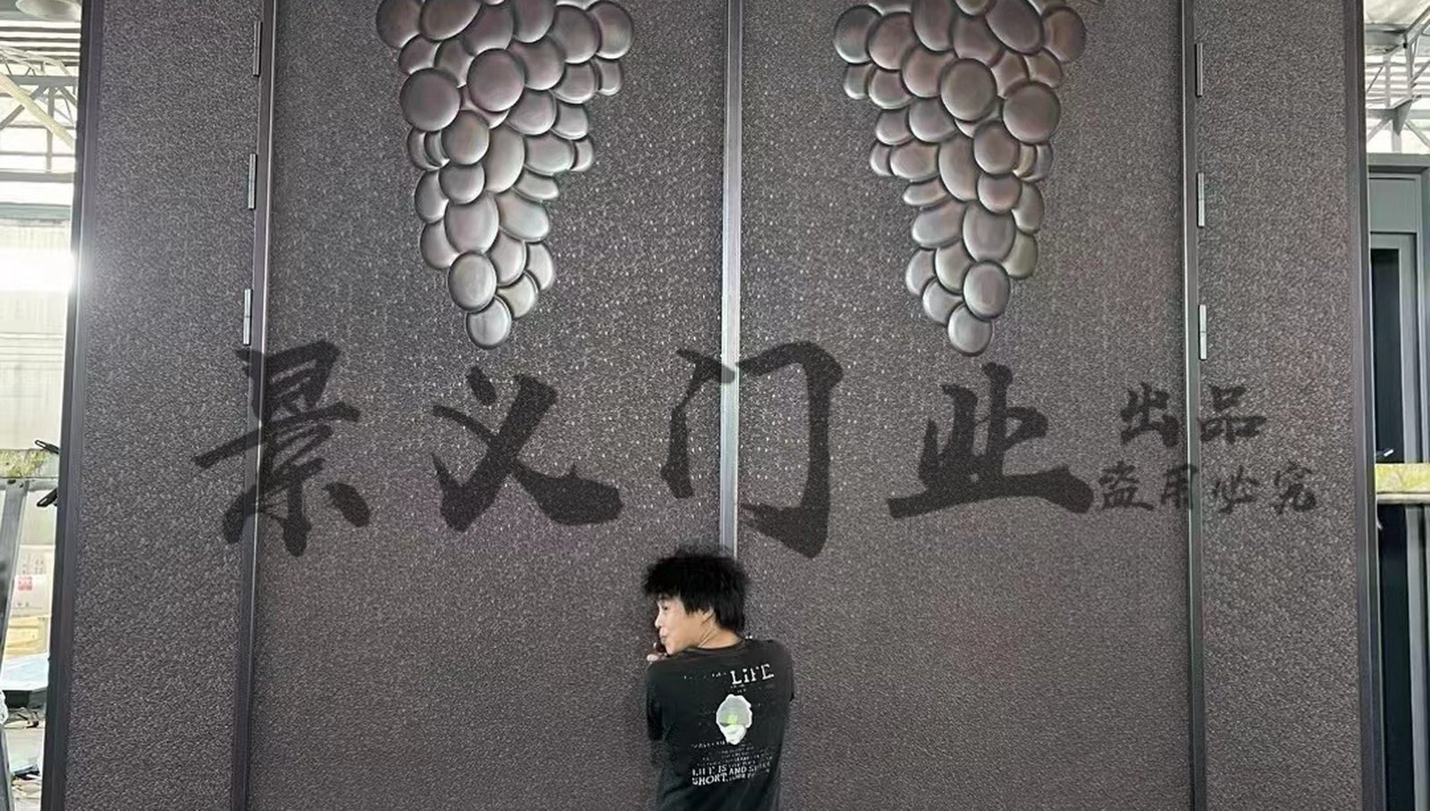 Oversized cast aluminum entrance door work in progress at Jingyi Doors